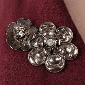 Elegant Silver Floral Brooch